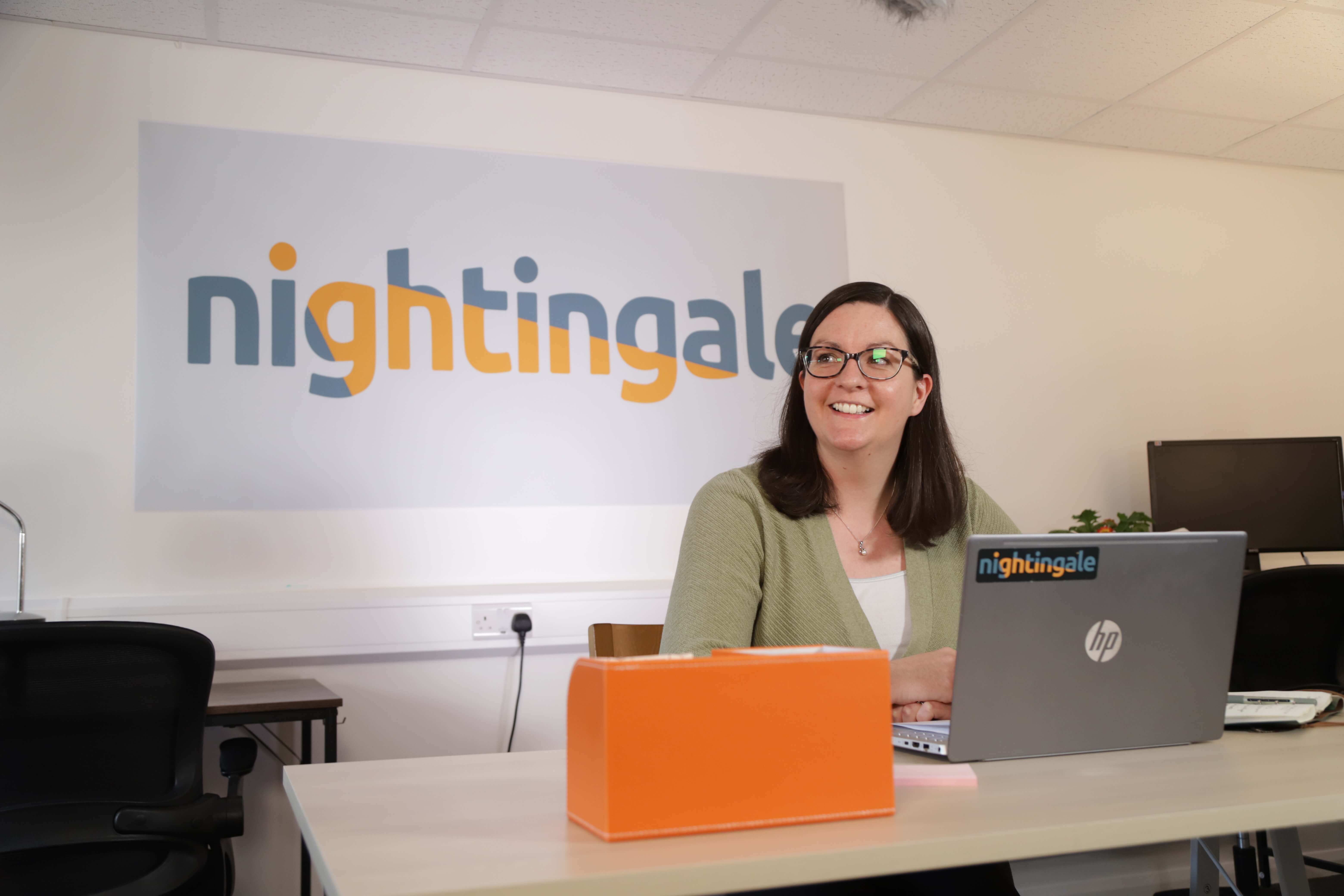 Image of Frances in front of nightingale banner