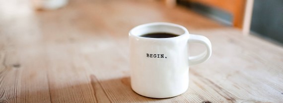Image of mug saying 'begin'