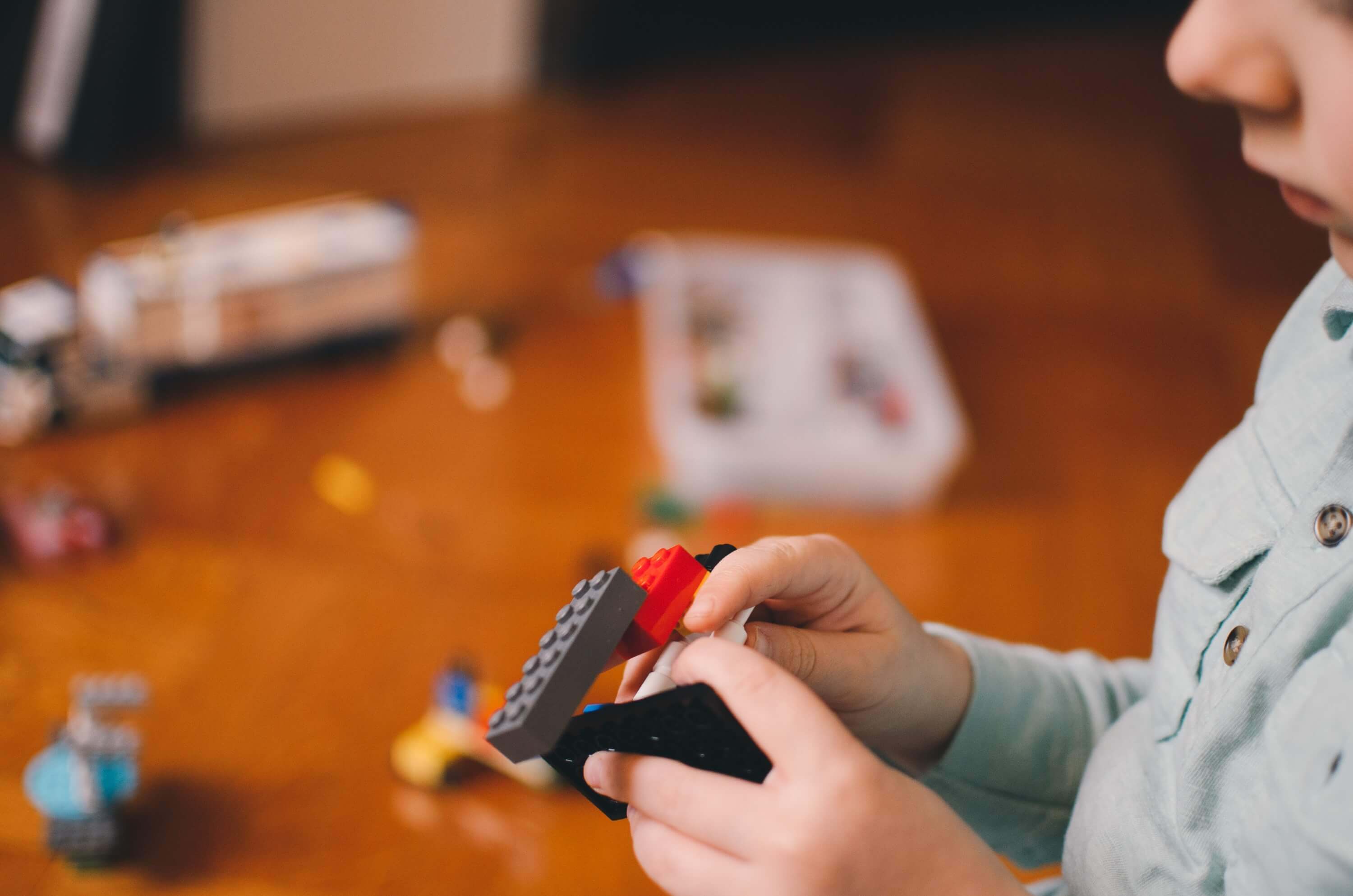 A child building with Lego.